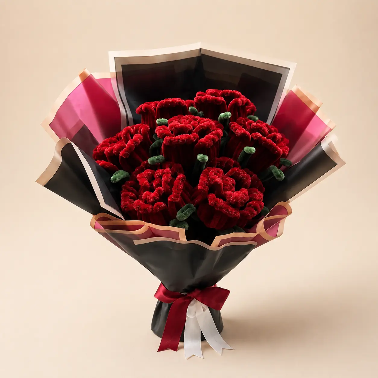 A generous gathering of deep red handmade roses.